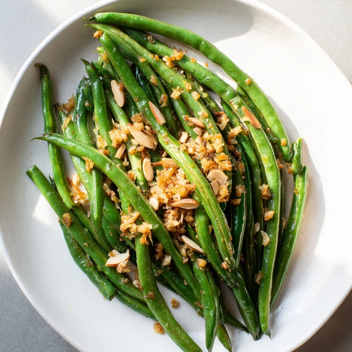 Tender, blanched Garlic Green Beans glistening from the pan, ready to serve and enjoy tonight.