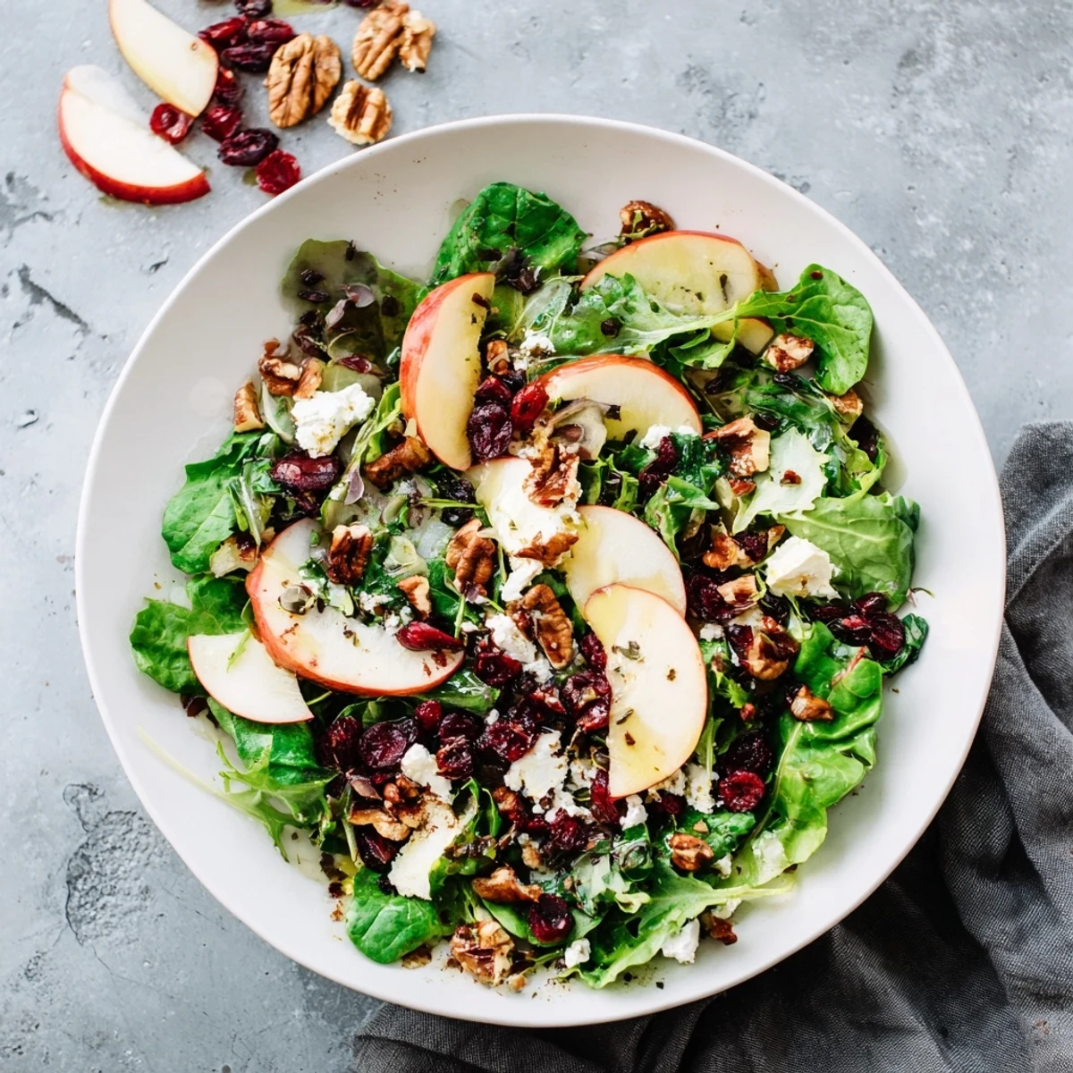 Close-up of a flavorful walnut salad, offering an image of fresh ingredients and tangy dressing.
