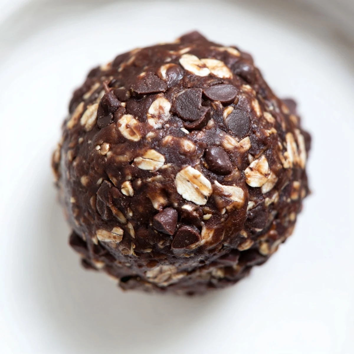 Bite-size Chocolate Peanut Butter Energy Balls with chia and flax seeds, perfect for a quick snack or pre-workout fuel.
