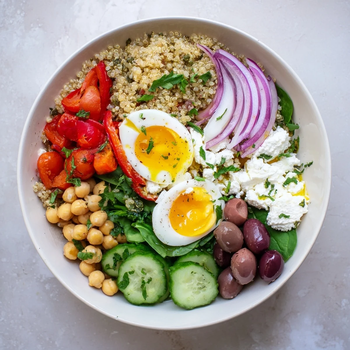 A colorful bowl of High Protein Mediterranean Breakfast Bowls with jammy eggs and creamy Greek yogurt.