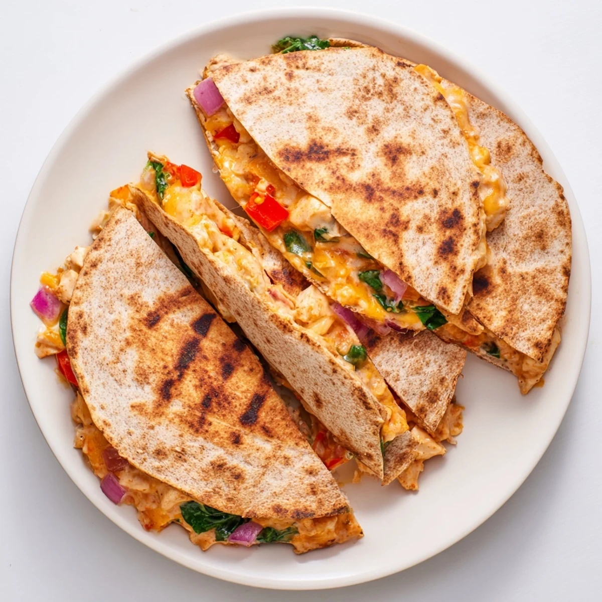 Crispy whole wheat tortilla filled with seasoned grilled chicken and creamy ranch Greek yogurt mixture