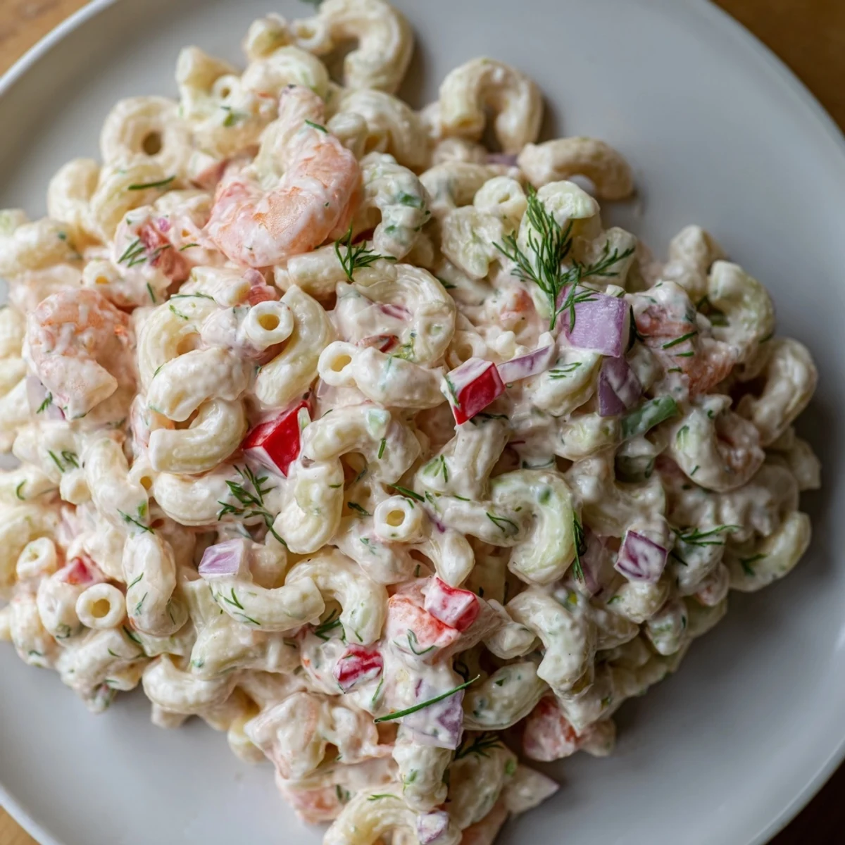 Creamy shrimp macaroni salad loaded with tender shrimp and crisp colorful vegetables
