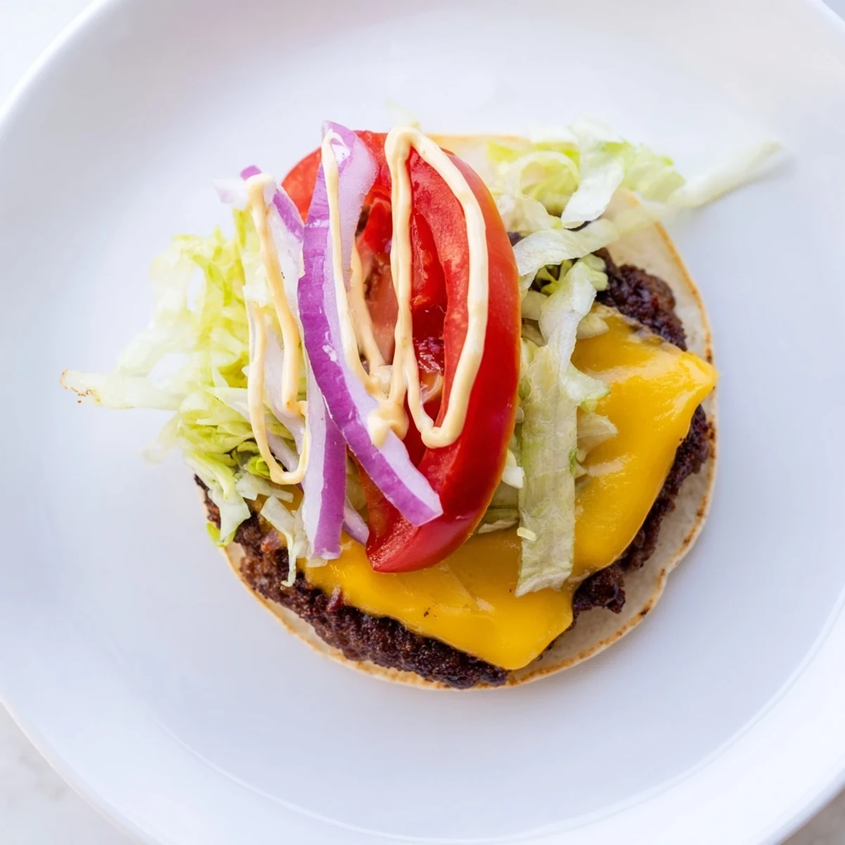 Crispy edges, melted cheddar in Smash Burger Tacos served with fries