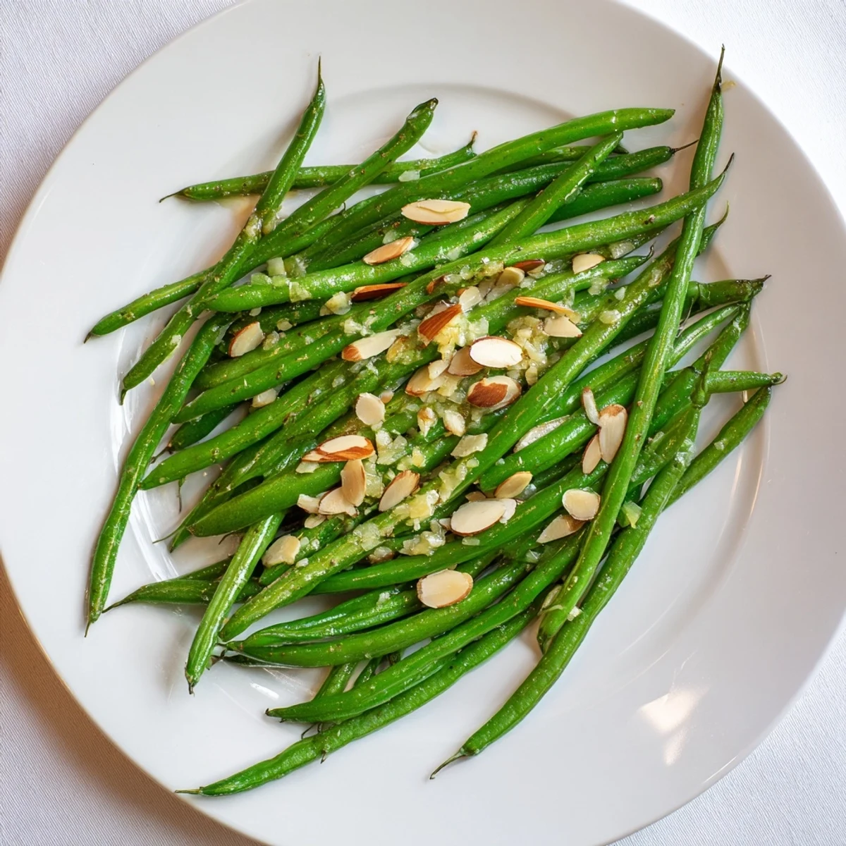 Fresh green beans sautéed in olive oil with sliced garlic for a crisp side dish