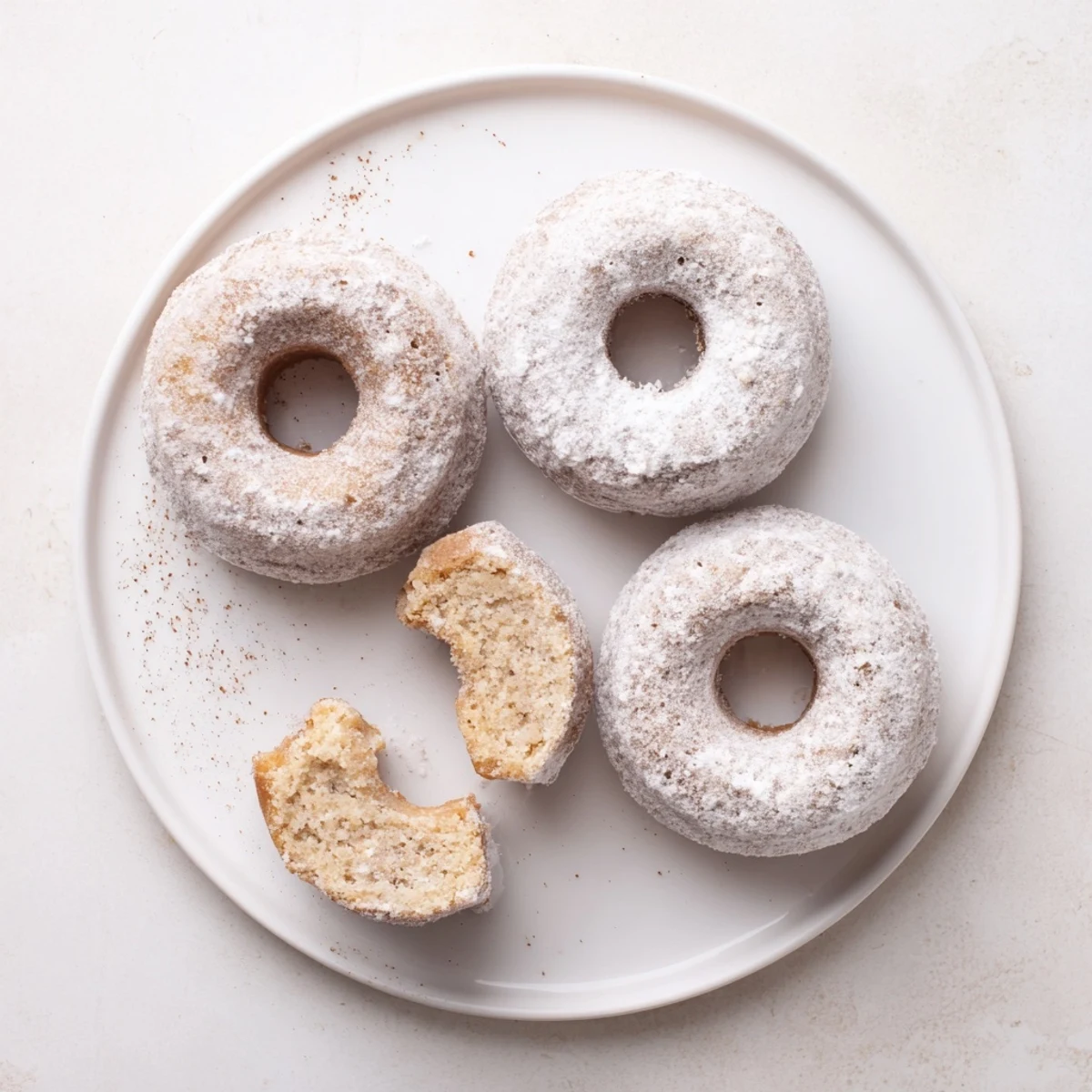 Warm Banana Donuts fresh from oven, golden tops and sweet aroma