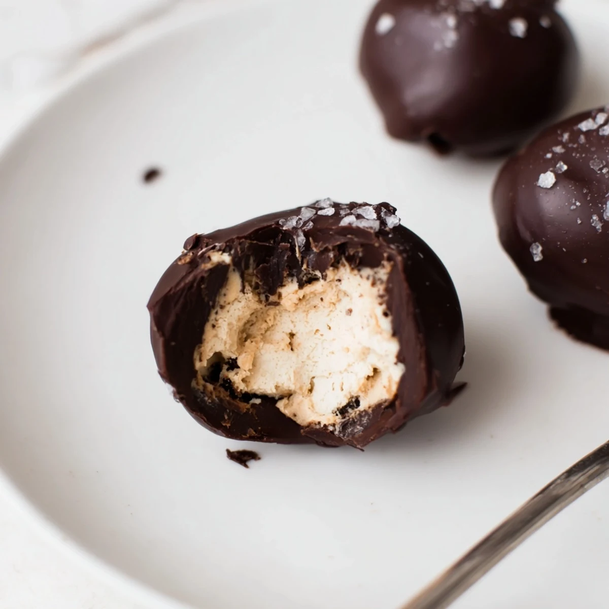 Frozen Peanut Butter Greek Yogurt Bites Dipped In Dark Chocolate With Sea Salt, chilled