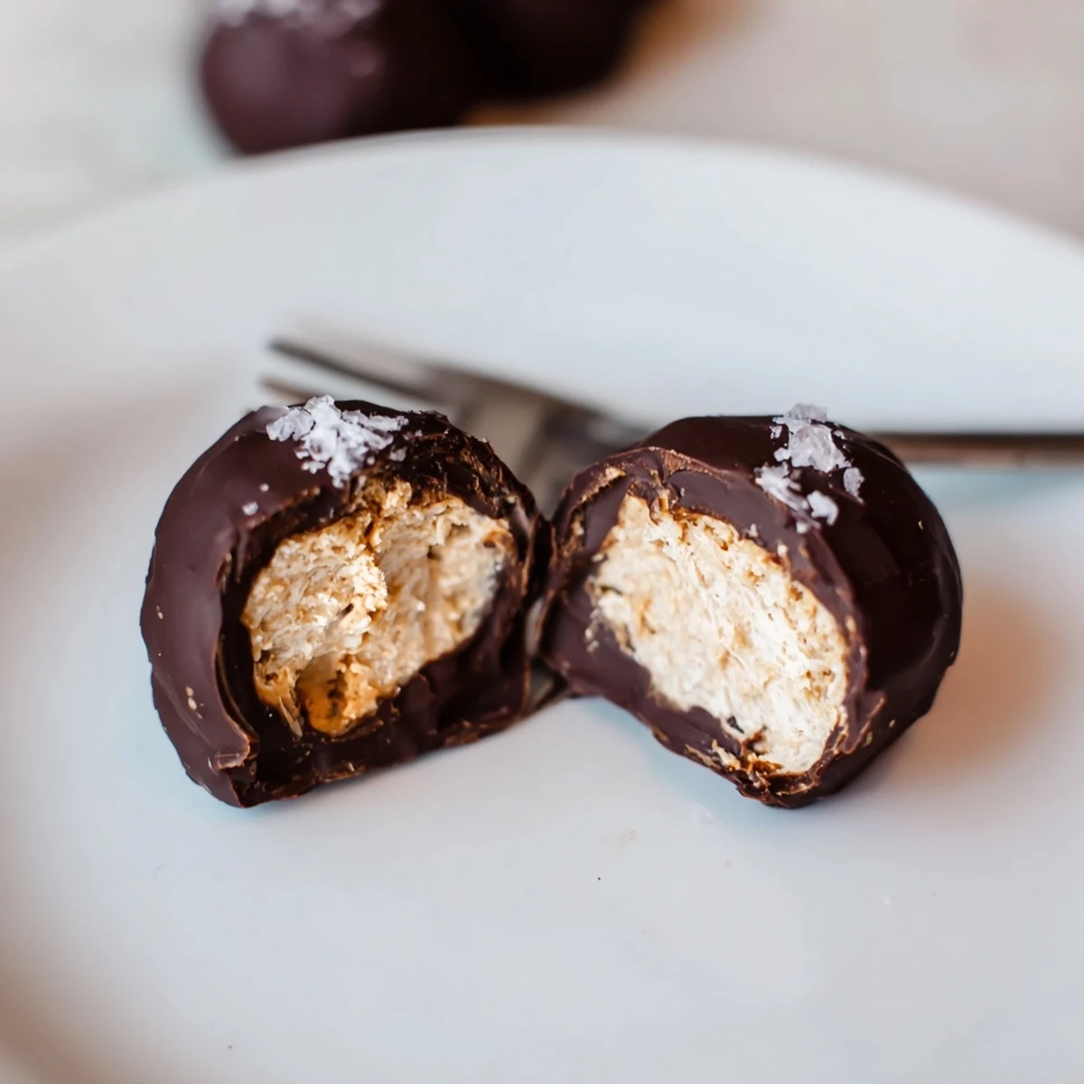Single-bite Frozen Peanut Butter Greek Yogurt Bites Dipped In Dark Chocolate With Sea Salt
