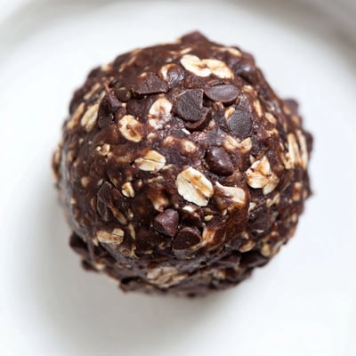 Bite-size Chocolate Peanut Butter Energy Balls with chia and flax seeds, perfect for a quick snack or pre-workout fuel.