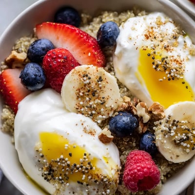 A vibrant Dietitians Balanced Breakfast Bowl with sliced bananas, crunchy walnuts, and a drizzle of honey for morning sweetness.